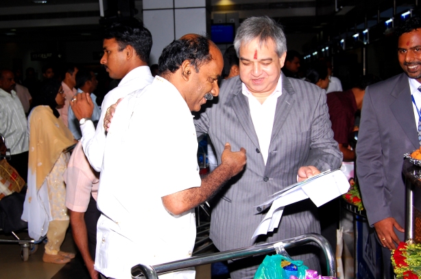 Mr. Prem Bajaj, CMD Bhadra International India Limited, Handing over the first boarding pass to the passenger